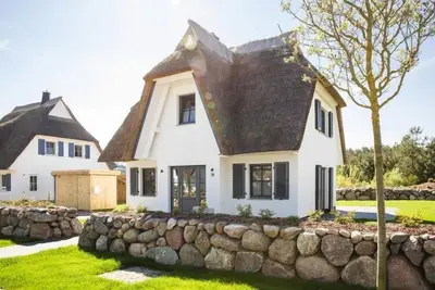 Image de Maison près de lagune avec sauna et plage