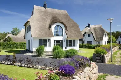 Image de Maison de Luxe CĂ´te Bodden avec Sauna Lagune