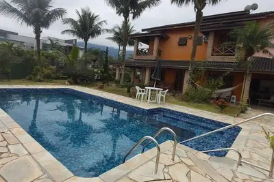 Image de Cozy house on the beach, with the tranquility of the countryside and the peace of the mountains.