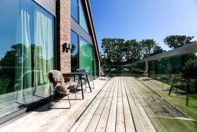 Image de Maison Fehmarn avec Sauna et Jardin