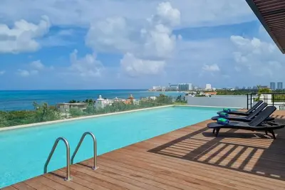 Image de 2br Modern Apt w/ Best Rooftop View in Cancun