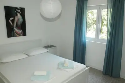 Image de Appartement de deux chambres avec la terrasse et la vue sur le mer Makarska (A-22168-a)