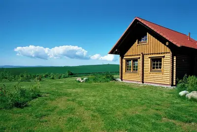 Image de Log cabin Robinson Crusoe - 1st row sea view, own sauna