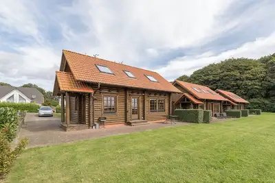 Image de Log cabin Admiral Nelson - 1st row sea view, own sauna