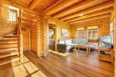 Image de Log cabin Alexander von Humboldt - 2nd row sea view, own sauna