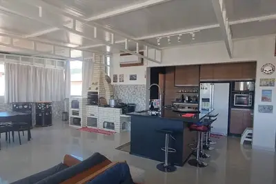 Image de Modern penthouse with gourmet kitchen 300 meters from the beach