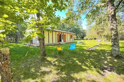 Image de Maison en forêt, calme, piste cyclable, proche ville et plages- meublé 3 étoiles