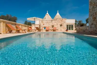 Image de Maison de vacances 'Trullo Amami Con Piscina Privata' avec piscine privée, Wi-Fi et climatisation