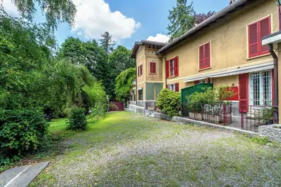 Image de Appartement \"Suite Con Camino E Terrazza\" avec terrasse privée, jardin partagé et Wi-Fi