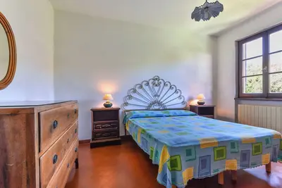 Image de Appartement 'Appartamento Spazioso Nel Verde' avec terrasse privée, jardin partagé et Wi-Fi