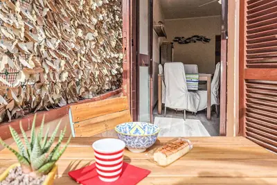 Image de Appartement 'Bilocale Scirocco De Luxe' avec terrasse privée et climatisation