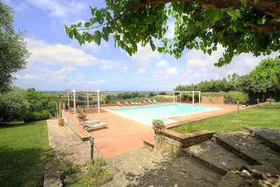 Villa dei Sorbi: A characteristic and welcoming three-story age-old farm house located on a hillside, facing the sea, with Free Wi-Fi.