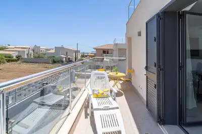 Image de Appartement 'Don Totò - Primo Piano' avec balcon, Wi-Fi et climatisation