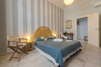 Image de Appartement 'Villa Corallo - Acqua Marina' avec vue sur la mer, Wi-Fi et climatisation