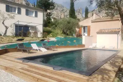 Image de A 10 mn Ă pied du village, maison neuve avec piscine et vue imprenable.
