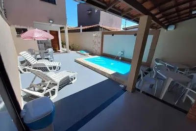 Image de Casa Duplex Climatizada com Piscina Para 8 Pessoas
