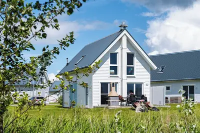Image de \"Strandlogde\" - Baltic Sea wooden holiday home with sauna near the beach - dogs welcome!
