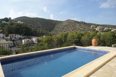 Image de Maison Alcalalí avec piscine et vue sur vallée