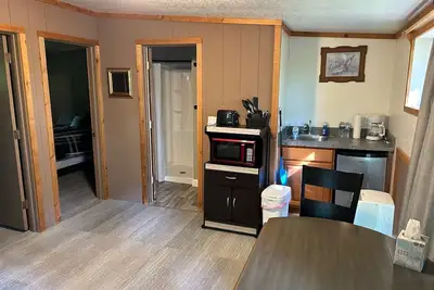 Image de Rustic cabins in secluded campground with lake access and woods to wander in.