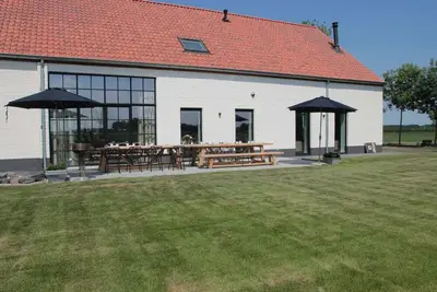 Image de Villa confortable à Zuidzande avec jardin privé