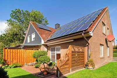 Image de Maison de vacances 'Ferienhaus Berdum' avec terrasse privée, jardin privé et Wi-Fi