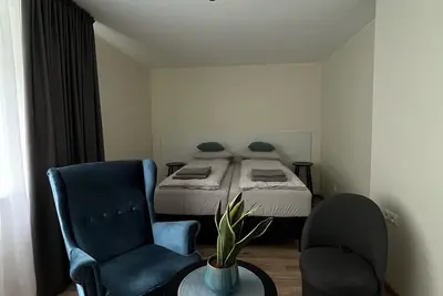 Image de Cozy 2-bedroom apartment in the village.