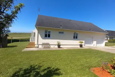 Image de maison proche de la mer