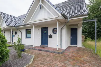 Image de Maison de vacances 'Ferienhaus Nordmeer' avec terrasse privée, jardin privé et Wi-Fi