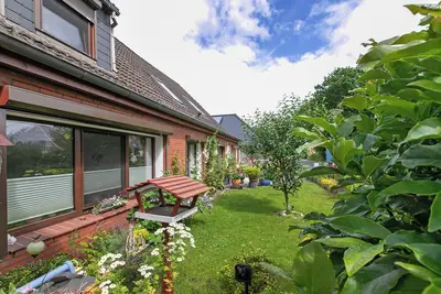 Image de Appartement 'Ferienwohnung Kiek In Hohn' avec terrasse privée, jardin partagé et Wi-Fi