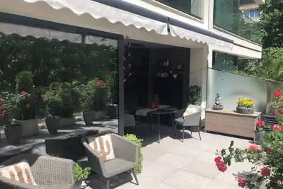 Image de Amazing garden terrace, fully equipped kitchen, private parking and free WiFi. \n