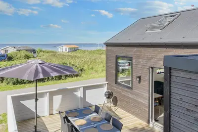Image de 5 etoiles maison de vacances a Farsø-By Traum