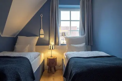 Image de Freundlich und GemĂĽtlich Eingerichtet Ferienwohnung mit Individuellen Charme