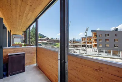 Image de Appartement 'Sweet Home - Pila Appartamenti' avec vue montagne et terrasse privée