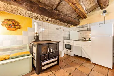 Image de Appartement 'Appartamento Del Vecchio Fienile' avec vue sur la montagne et jardin commun