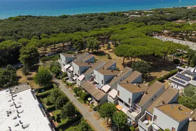 Image de Appartement 'Appartamento Vicino Mare' avec terrasse privée et jardin partagé