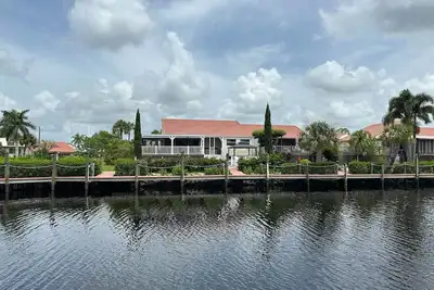 Image de Gated Community of Emerald Pointe Tennis & Yacht Club-No Villa Storm Damage!