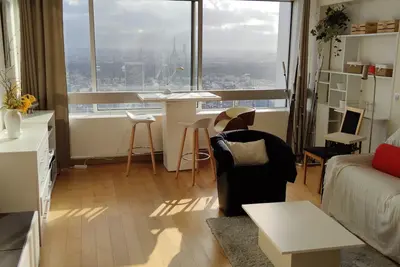 Image de Paris fabuleux T2 meublé vue plongeante sur Tours Eiffel et Montparnasse