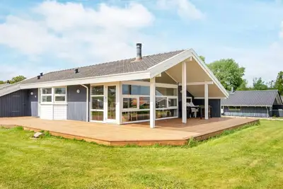 Image de Maison de vacances pour 8 a Sjølund-By Traum