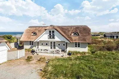 Image de Maison de vacances pour 12 a Hirtshals-By Traum