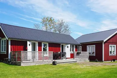Image de Maison de vacances pour 4 a STRĂ–MSTAD-By Traum