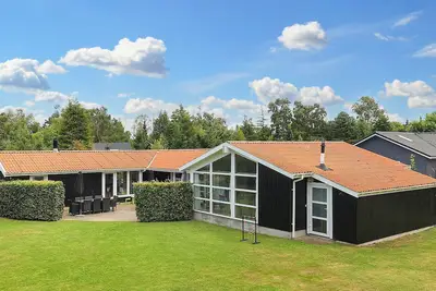 Image de Maison de vacances pour 14 a Væggerløse-By Traum