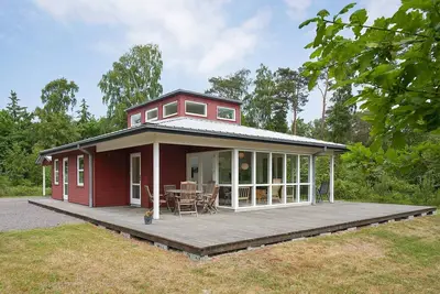 Image de Maison de vacances pour 6 a Aakirkeby-By Traum