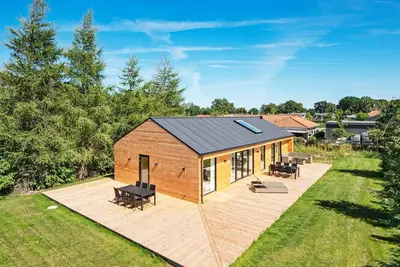 Image de Maison de vacances pour 10 a Glesborg-By Traum
