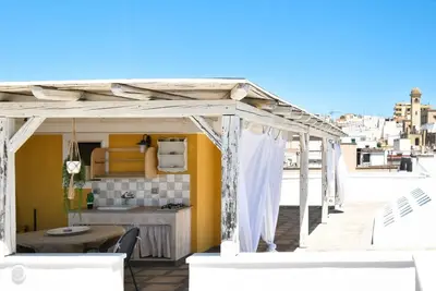 Image de Les Maisons: La Mansardina by Rentbeat