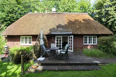 Image de Maison de vacances 'Ferienhaus Reetkate Breklum' avec terrasse partagée, jardin partagé et Wi-Fi