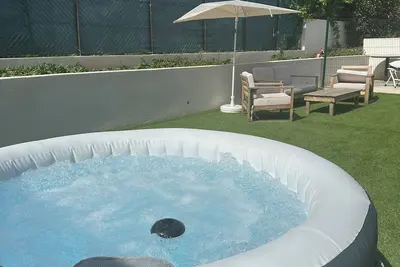 Image de Bas de maison cosy avec jardin privatif