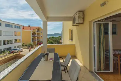 Image de The house is located in a quiet resort with private villas near the sea.