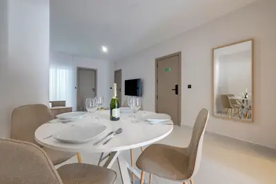 Trendy Apartment Steps from the Sea