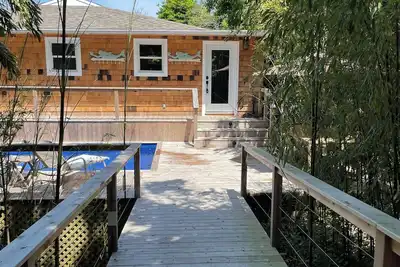 Image de Pristine 7br 4. 5ba house w/ heated Pool at Fire Island Pines 500' to ocean