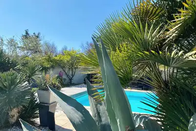 Image de Maison privée tout bord de plage avec piscine